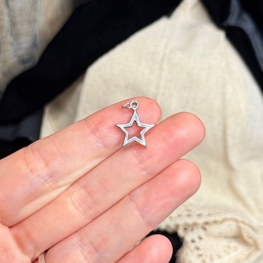 Celestial Sterling Silver Cut Out Star Pendant